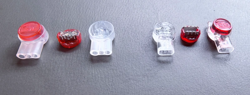 UR and UR2 jelly crimp connectors open cap showing internal gel and IDC blade