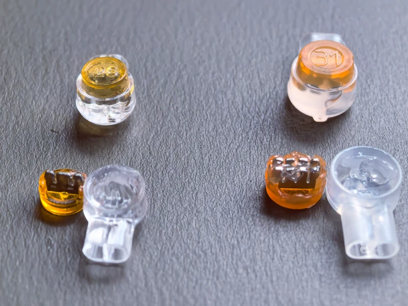 UY and UY2 jelly crimp connectors open cap showing internal gel and IDC blade
